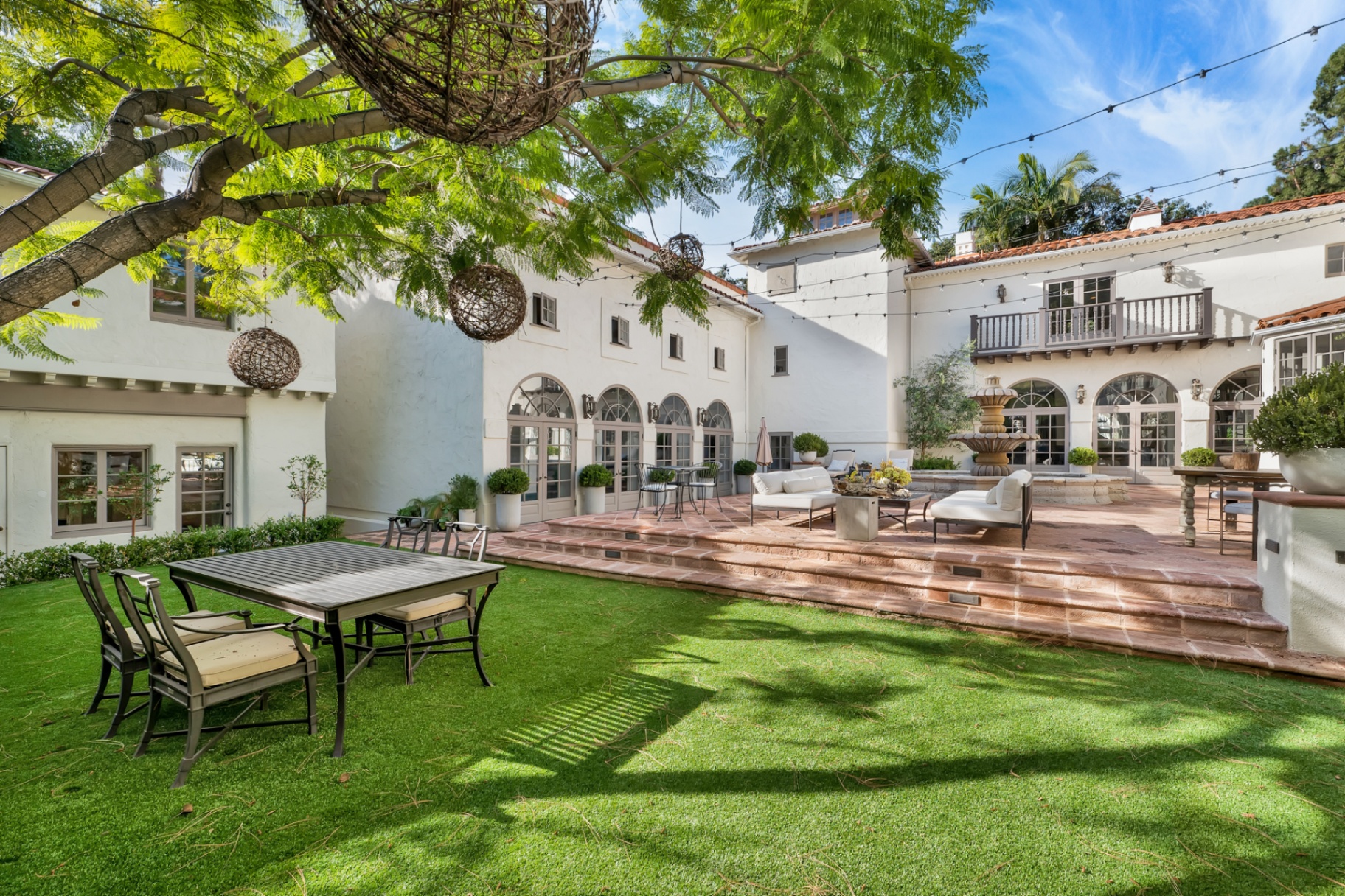 Arched loggia wrapping the courtyard