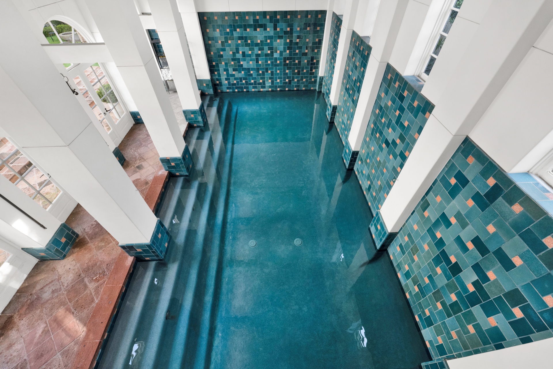 Aerial view of the tiled indoor pool